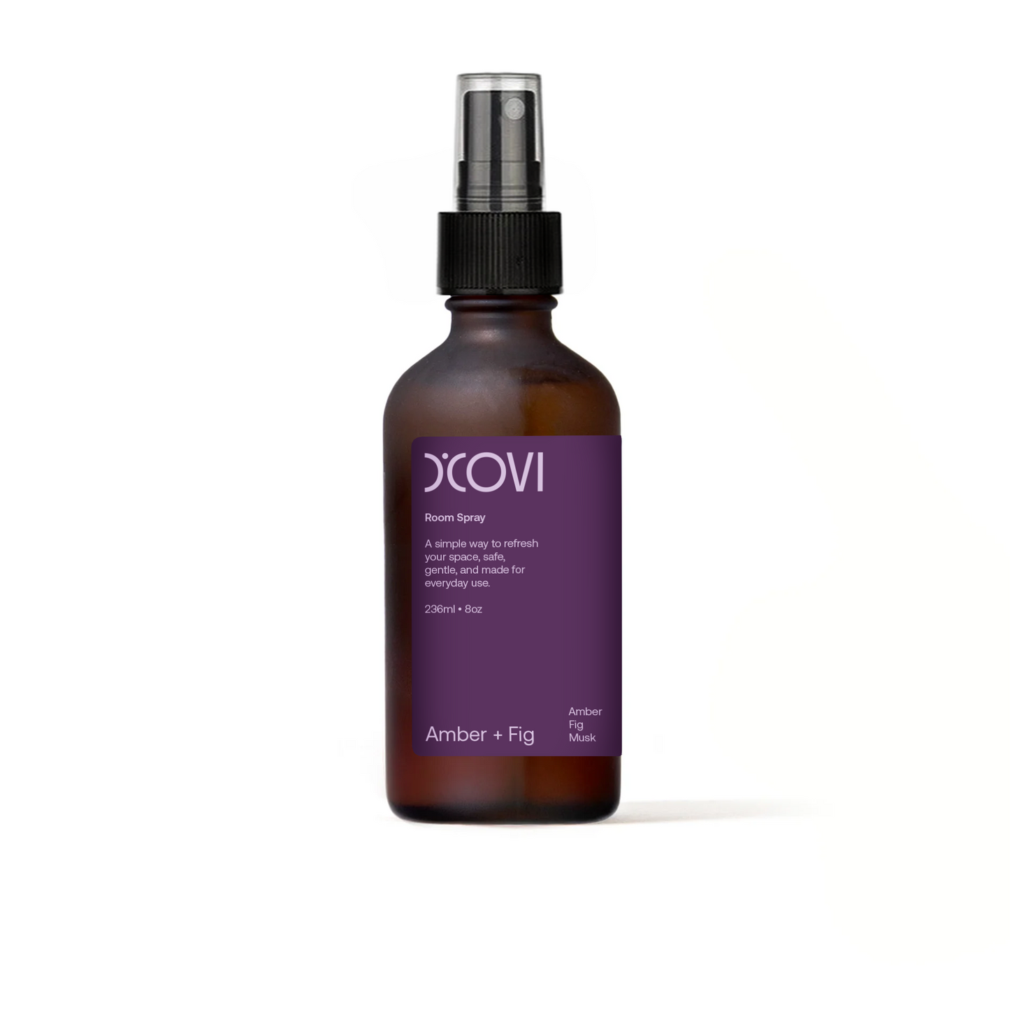 Amber Fig Room Spray in Brown glass spray bottle with purple label on a white background
