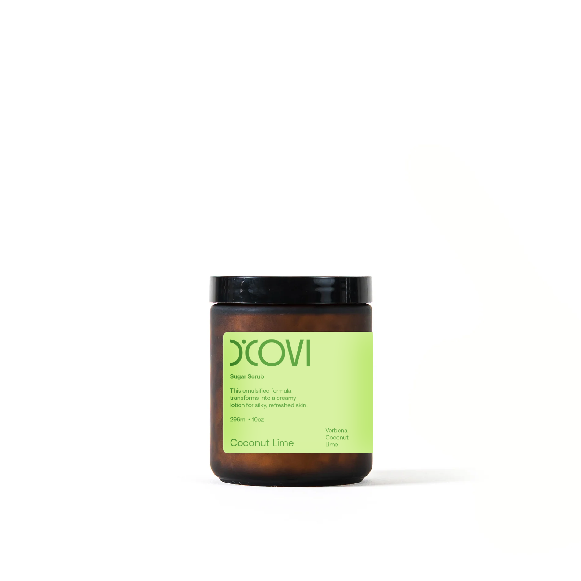 Jar of D'COVI coconut lime body scrub in a frosted amber glass jar with green label on a white background