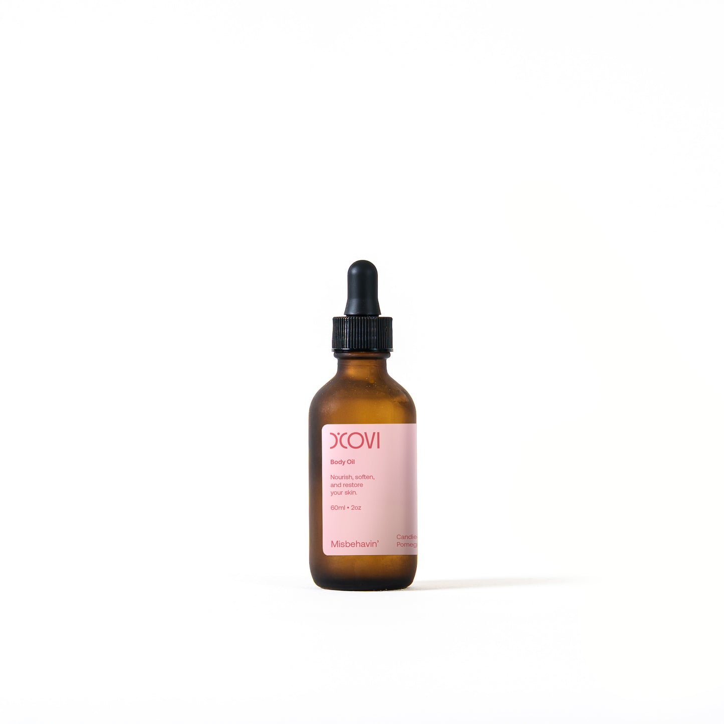 Amber glass bottle with black dropper and light pink label containing 60ml (2oz) of Misbehavin' body oil