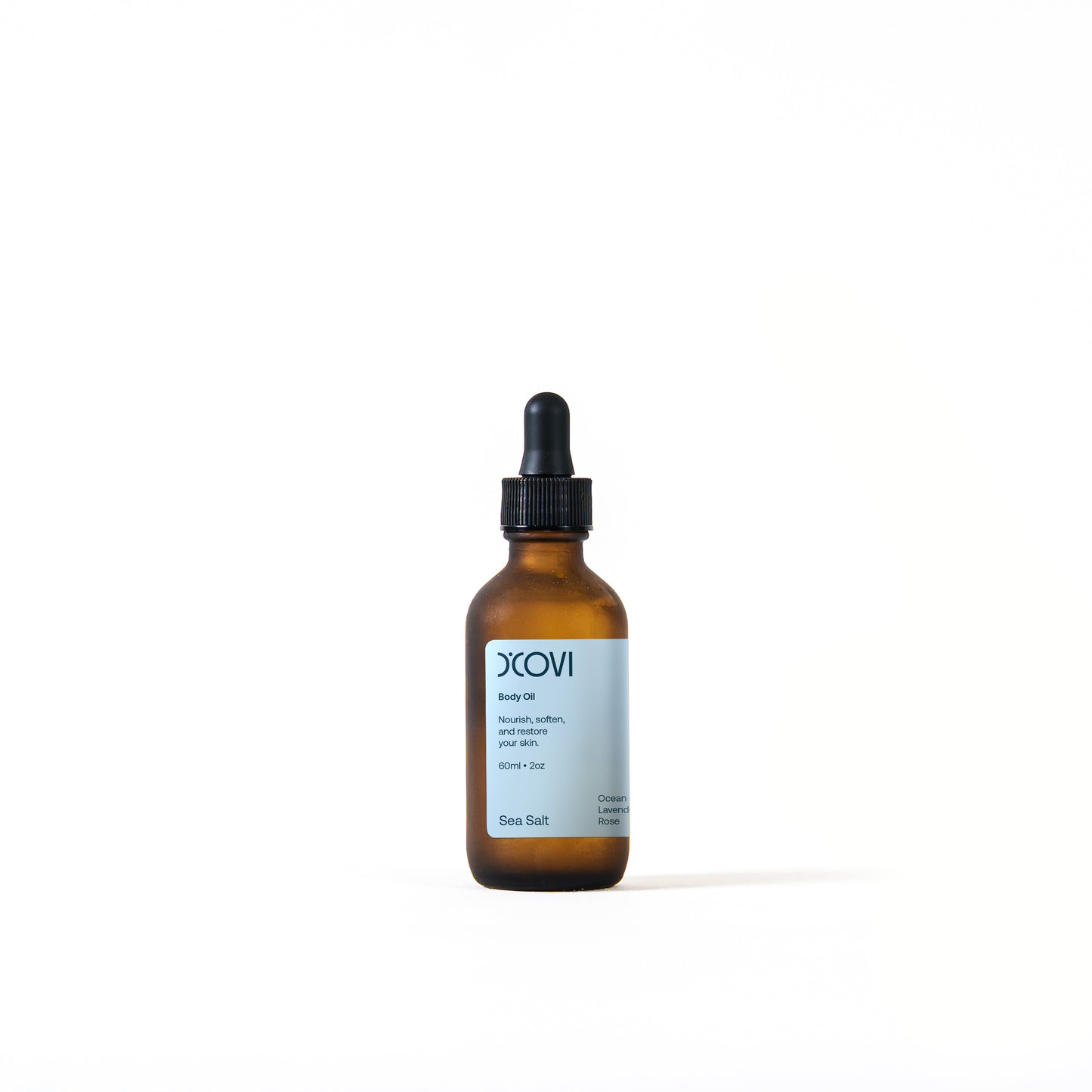 Amber glass bottle with black dropper and light blue label containing 60ml (2oz) of Sea Salt body oil