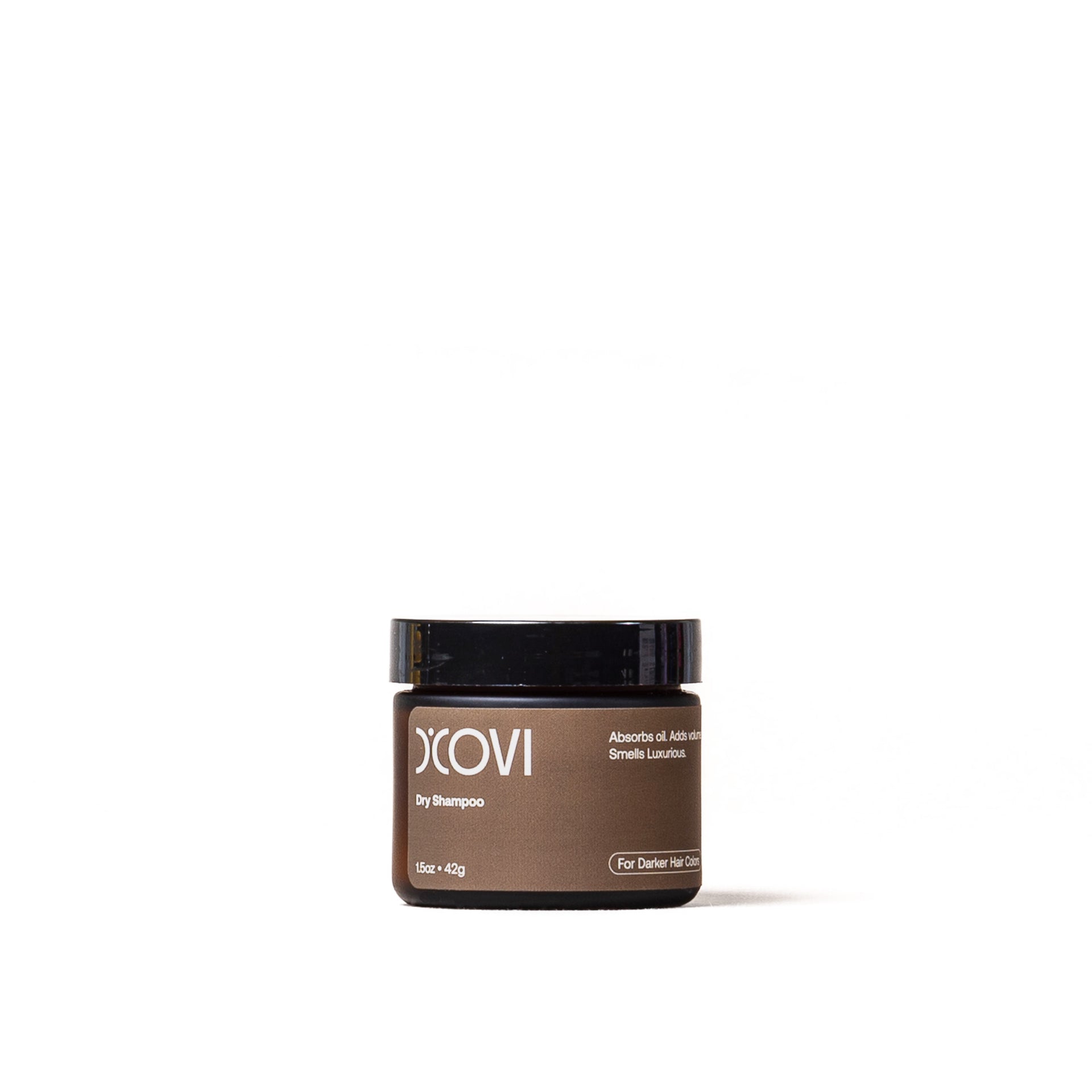 D'Covi Dark Hair dry shampoo jar on a white background. Brown label for darker hair colors 