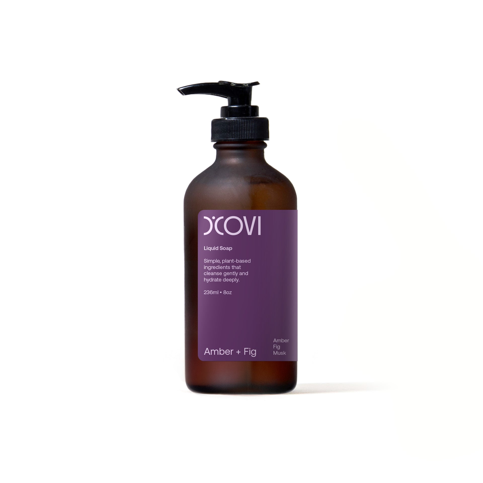 D'Covi amber glass bottle with black pump and purple label on a white background. Containing 236ml (8oz) Amber + Fig liquid soap.