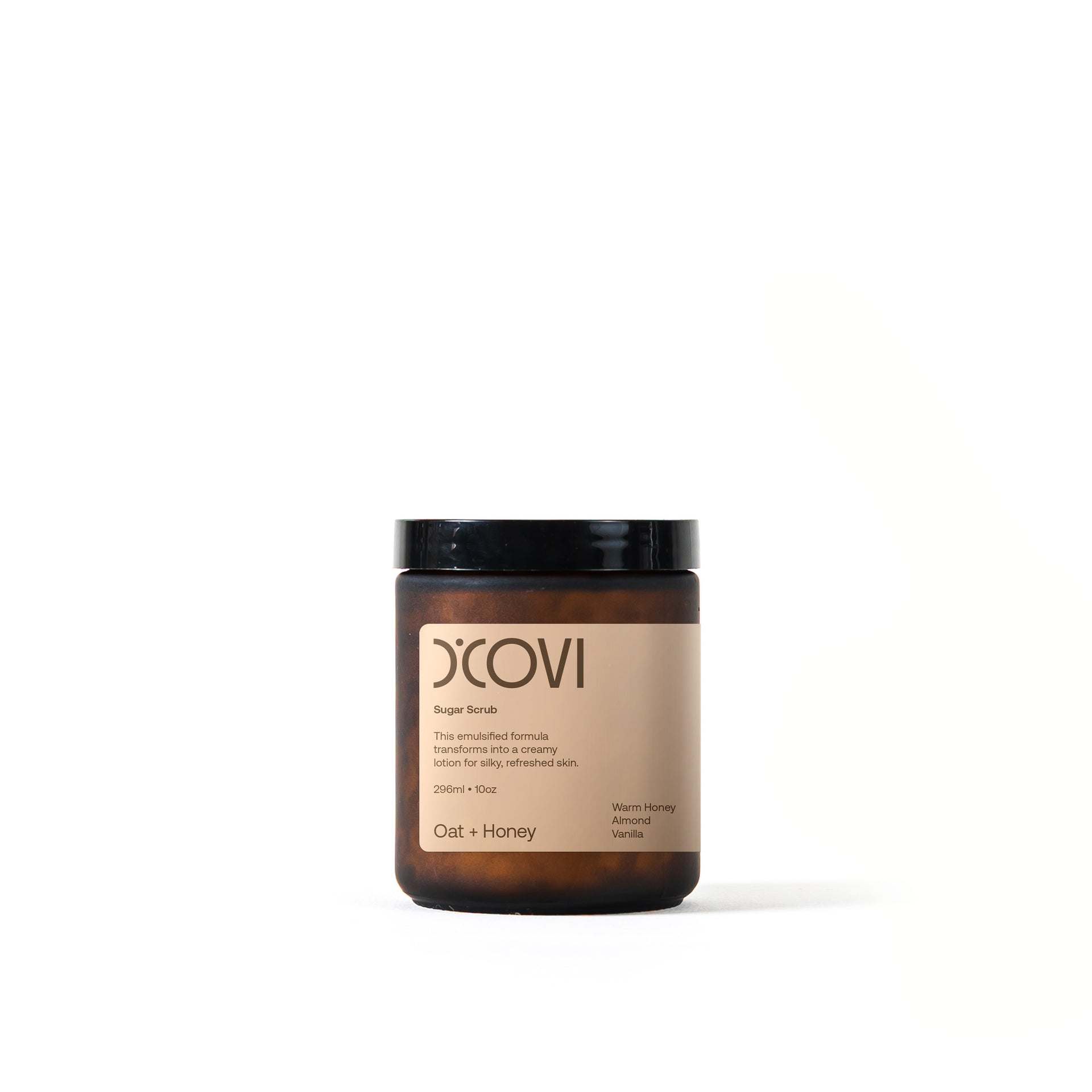D’Covi amber glass jar with black lid containing 296ml (10oz) of Oat and Honey sugar scrub