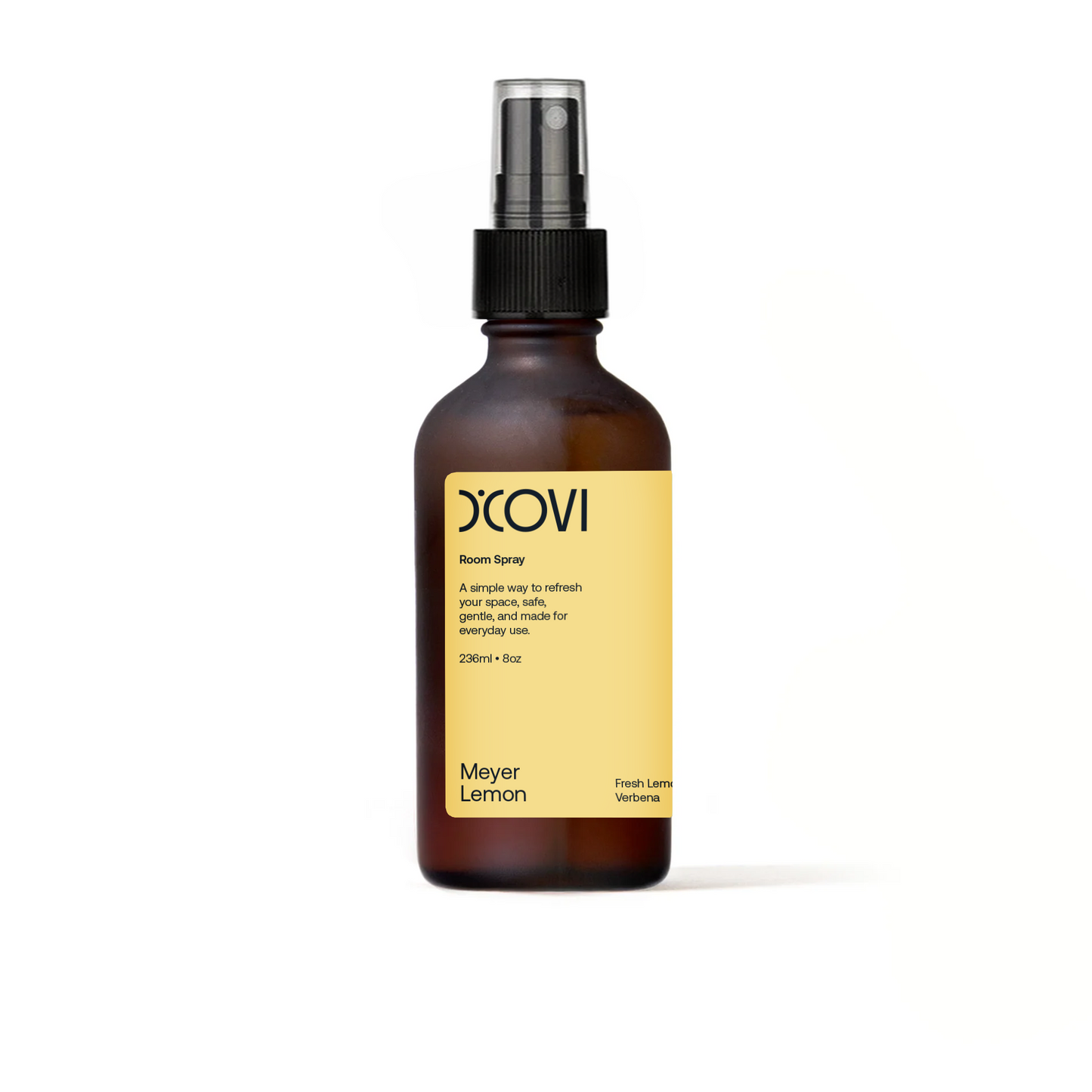 Meyer Lemon Scented Room spray in a glass bottle with yellow label on a white background