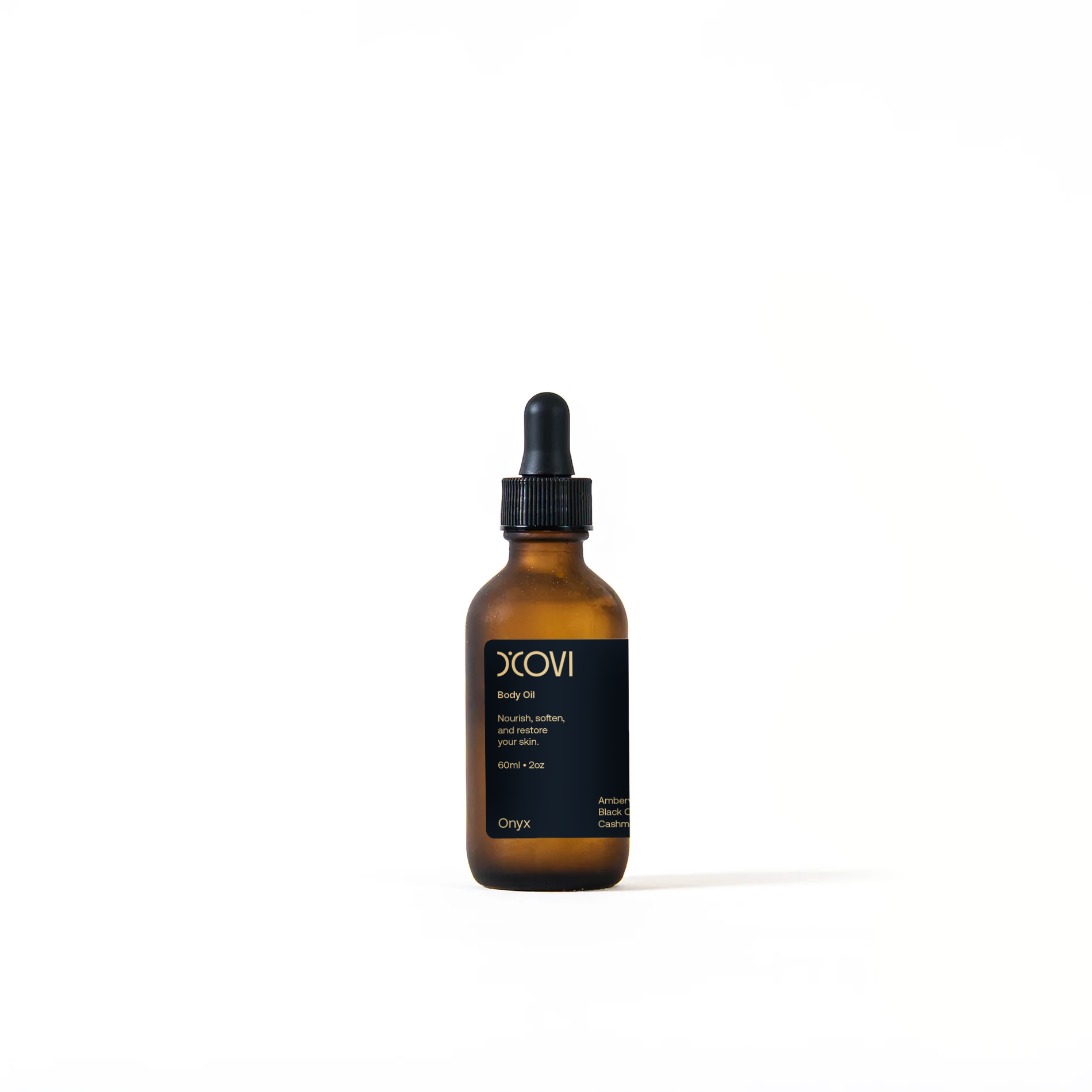 D'Covi Onyx Body Oil in Brown glass bottle with black cap on a white background